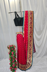 Carrot Pink Soft-Silk Paithani Saree with Gold Zari Lotus Border & Meenakari Flower Butti – Wedding & Festive Wear