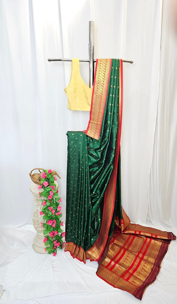 Green Soft-Silk Gadwal Saree with Copper Zari Peacock Border & Rich Pallu – Wedding & Festive Wear