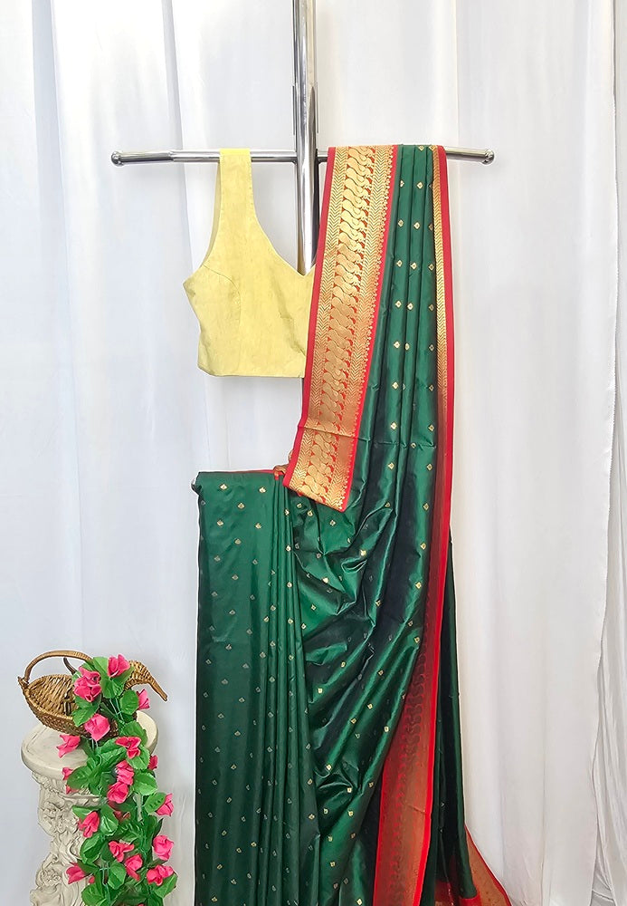 Green Soft-Silk Gadwal Saree with Copper Zari Peacock Border & Rich Pallu – Wedding & Festive Wear