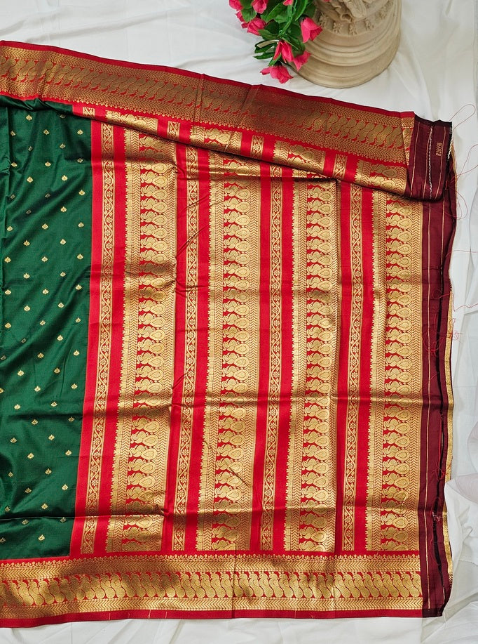 Green Soft-Silk Gadwal Saree with Copper Zari Peacock Border & Rich Pallu – Wedding & Festive Wear