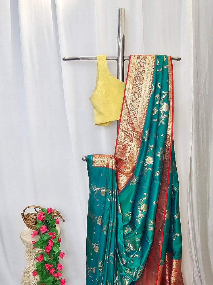 Sea Green Soft Silk Banarasi Saree with Gold Zari Floral Border & Heavy Brocade Pallu – Wedding & Festive Wear