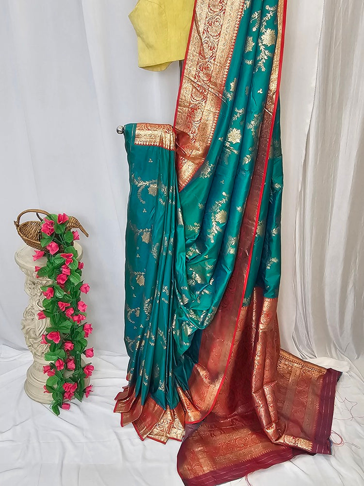 Sea Green Soft Silk Banarasi Saree with Gold Zari Floral Border & Heavy Brocade Pallu – Wedding & Festive Wear