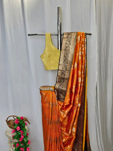 Orange Soft-Silk Banarasi Saree with Gold Zari Floral & Peacock Border and Heavy Brocade Pallu – Wedding & Festive Wear
