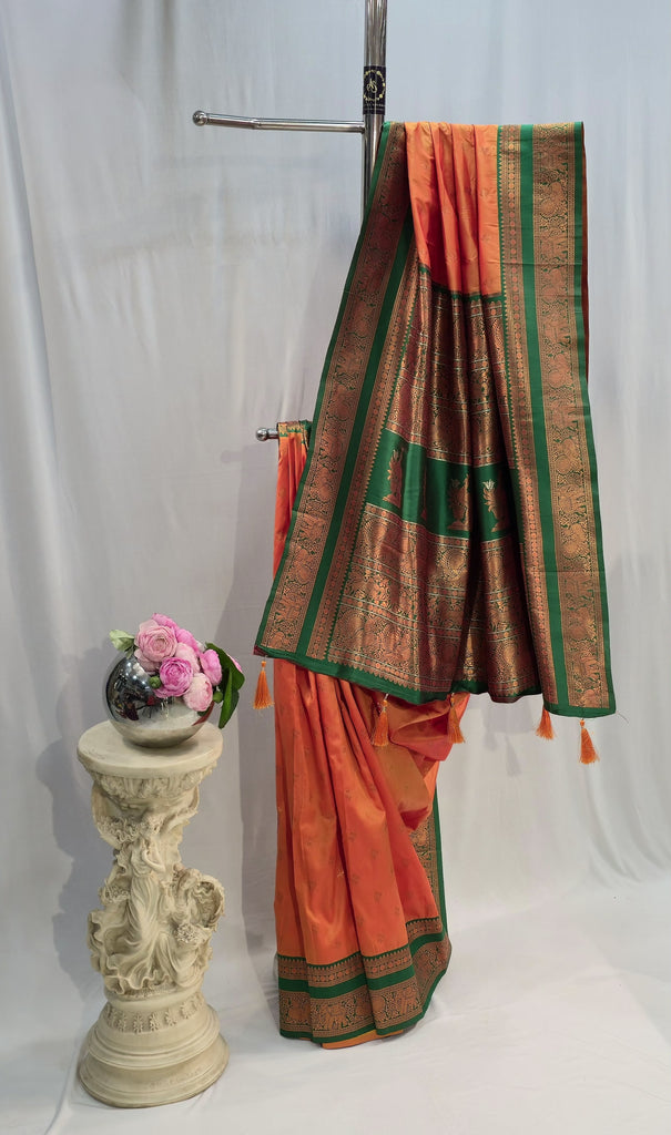 Saffron Soft Silk Saree with Flower Butti & Hatti Border