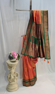 Saffron Soft Silk Saree with Flower Butti & Hatti Border