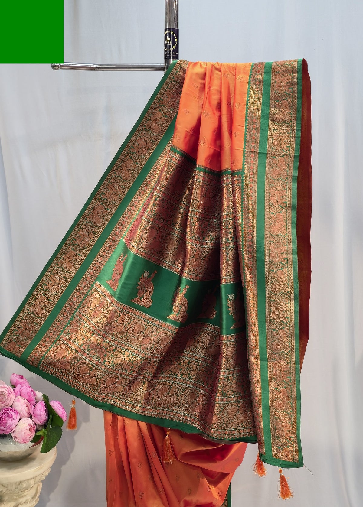 Saffron Soft Silk Saree with Flower Butti & Hatti Border