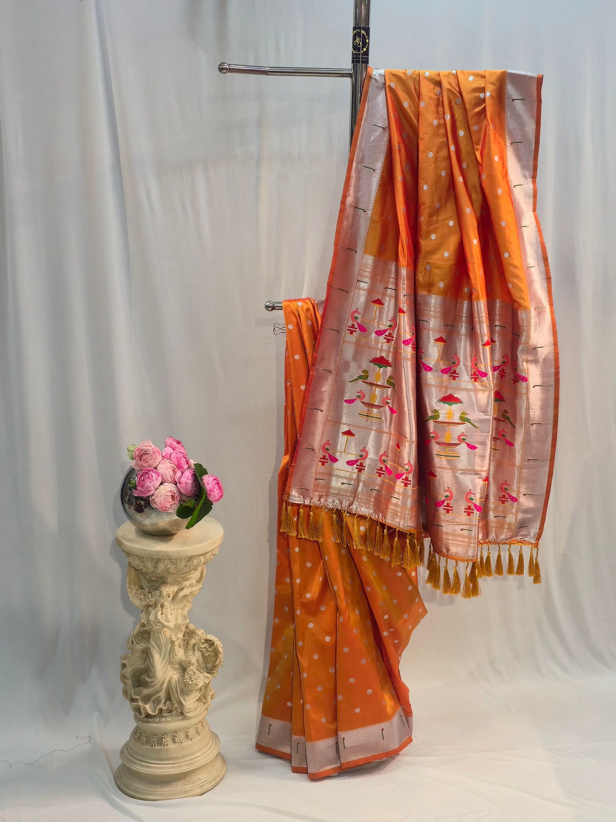 Saffron Soft Silk Saree with Muniya Border & Round Butti