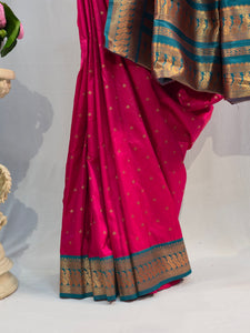 Rani Pink Soft Silk Saree with Peacock Border & Flower Butti