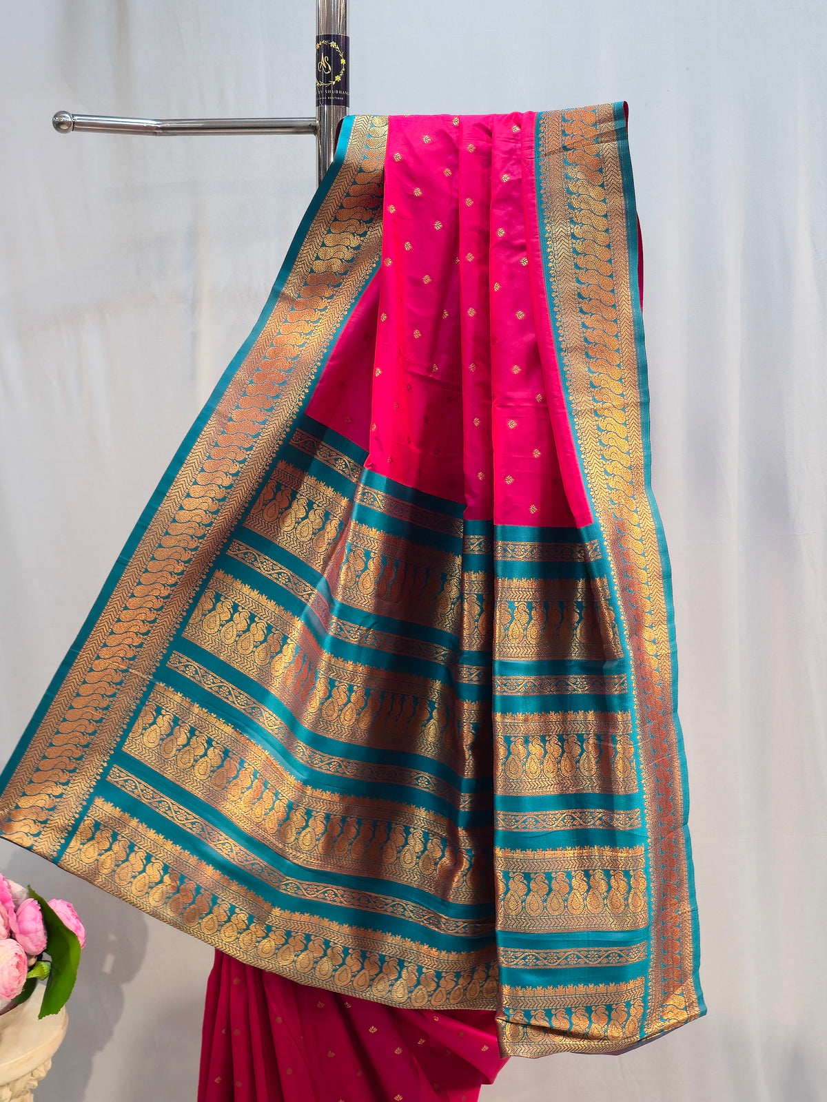 Rani Pink Soft Silk Saree with Peacock Border & Flower Butti