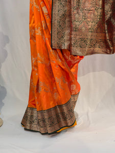 Saffron Soft Silk Saree with Floral Border & All-Over Floral Design