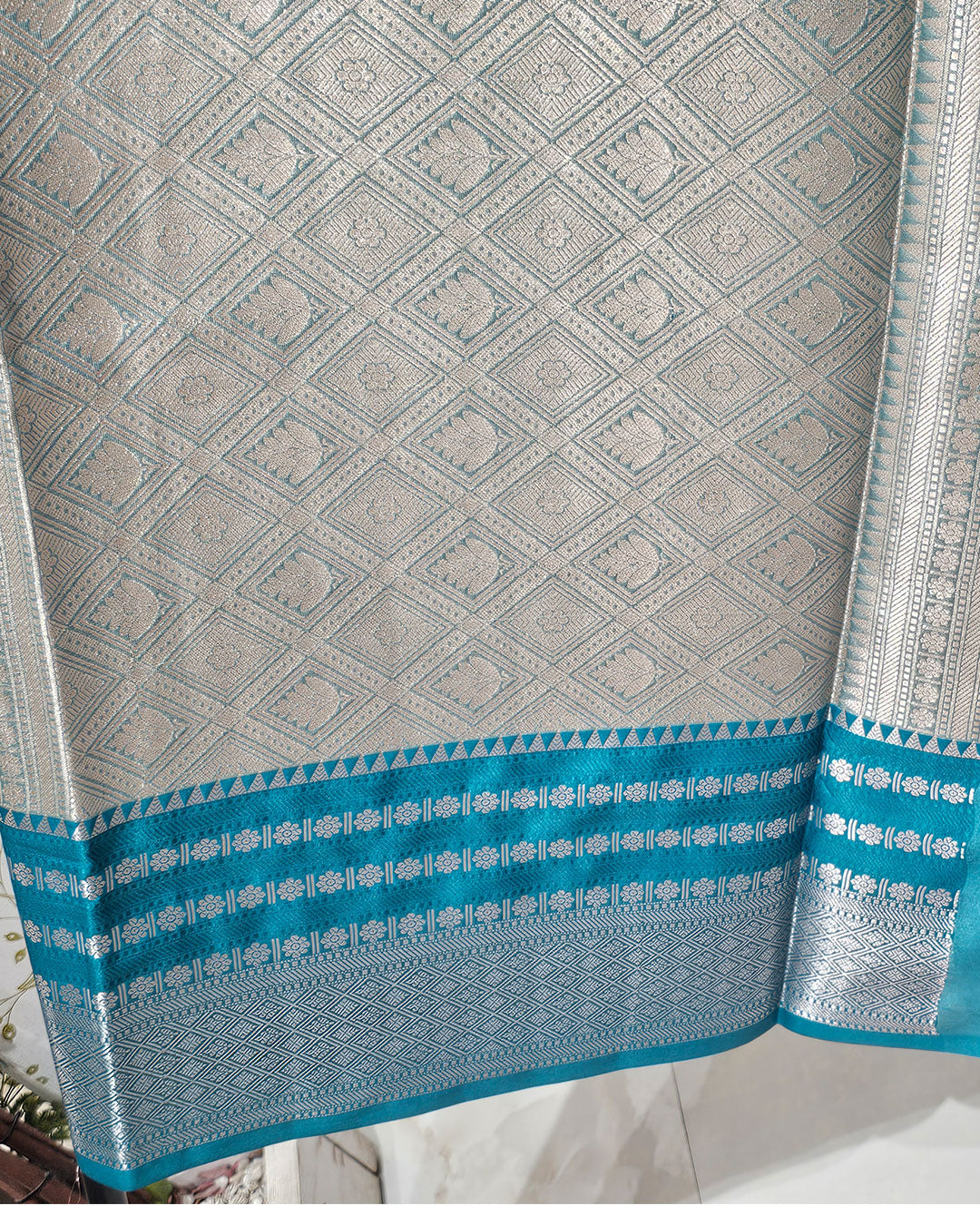 Tissue Kanjivaram Saree  Lotus Jaal with Checked Skirt Border & Brocade Pallu